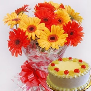 12 Yellow And Orange Gerberas With Half Kg Pineapple Cake