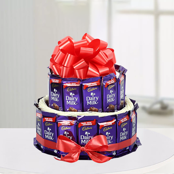 32 Pcs Cadbury Dairy Milk Chocolates Arranged In Two Circular Layers