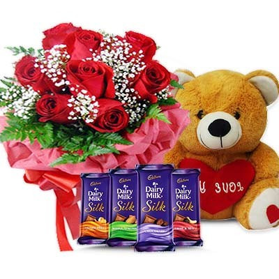 Gift Combo Of 10 Red Roses With 12 Inch Teddy Bear And 4 Cadbury Dairy Millk Silk