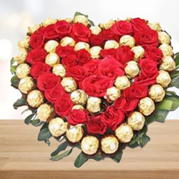 35 Red Roses With 32 Ferrero Rocher Chococlate In Heartshape Arrangement