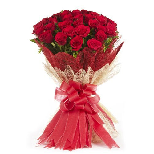 25 Red Roses In Jute Packing