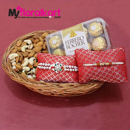 The rakhi set of Ferrero Rocher Chocolate and dried fruits