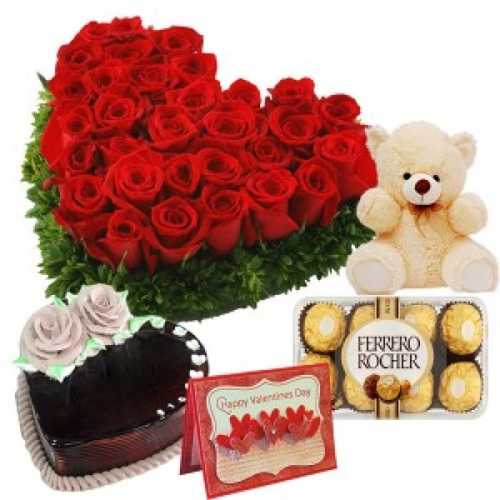 Combo Gift Of Heartshape Arrangement Of 30 Red Roses, 1Kg Heartshape Chocolate Truffle Cake, 16Pcs Ferrero Rocher Chocolate, 6 Inch Cute Teddy And Valentine Greeting Card