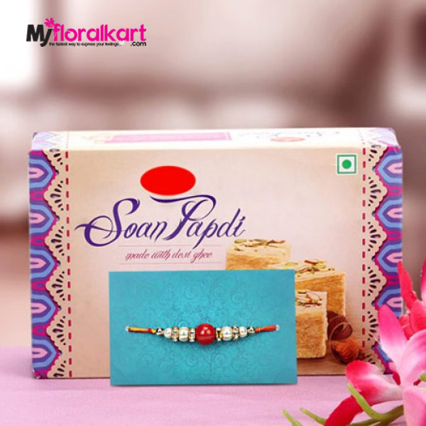 Delightful pearl bead rakhi with son papdis